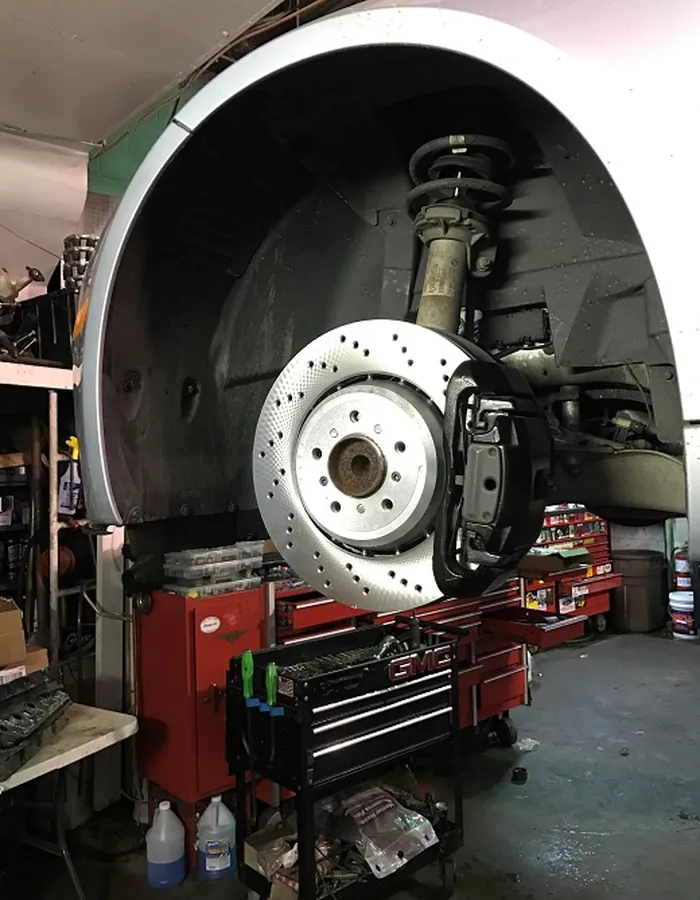 New brake rotor and pads after replacement