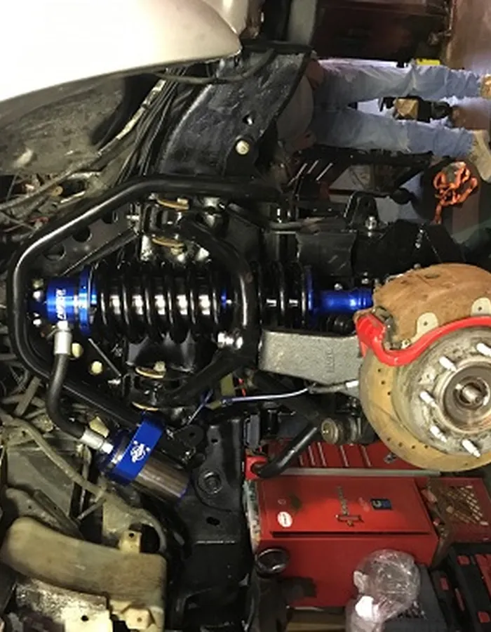 New strut and spring assembly after replacement
