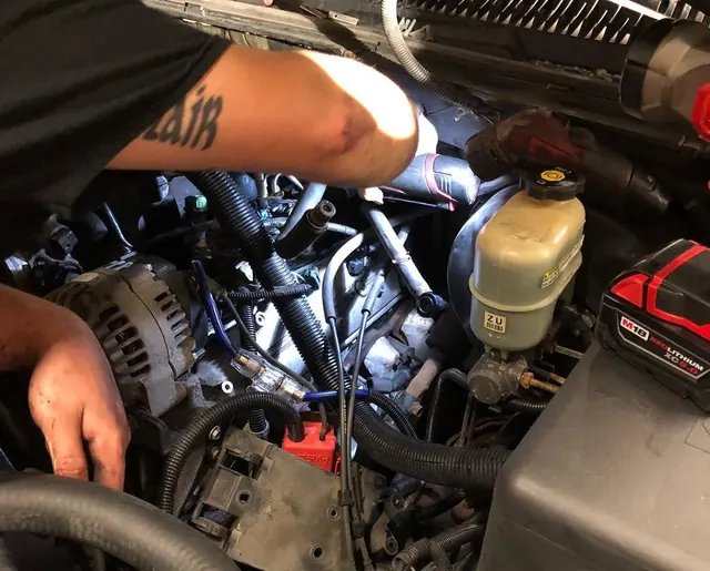 Working in an engine bay with a cordless drill
