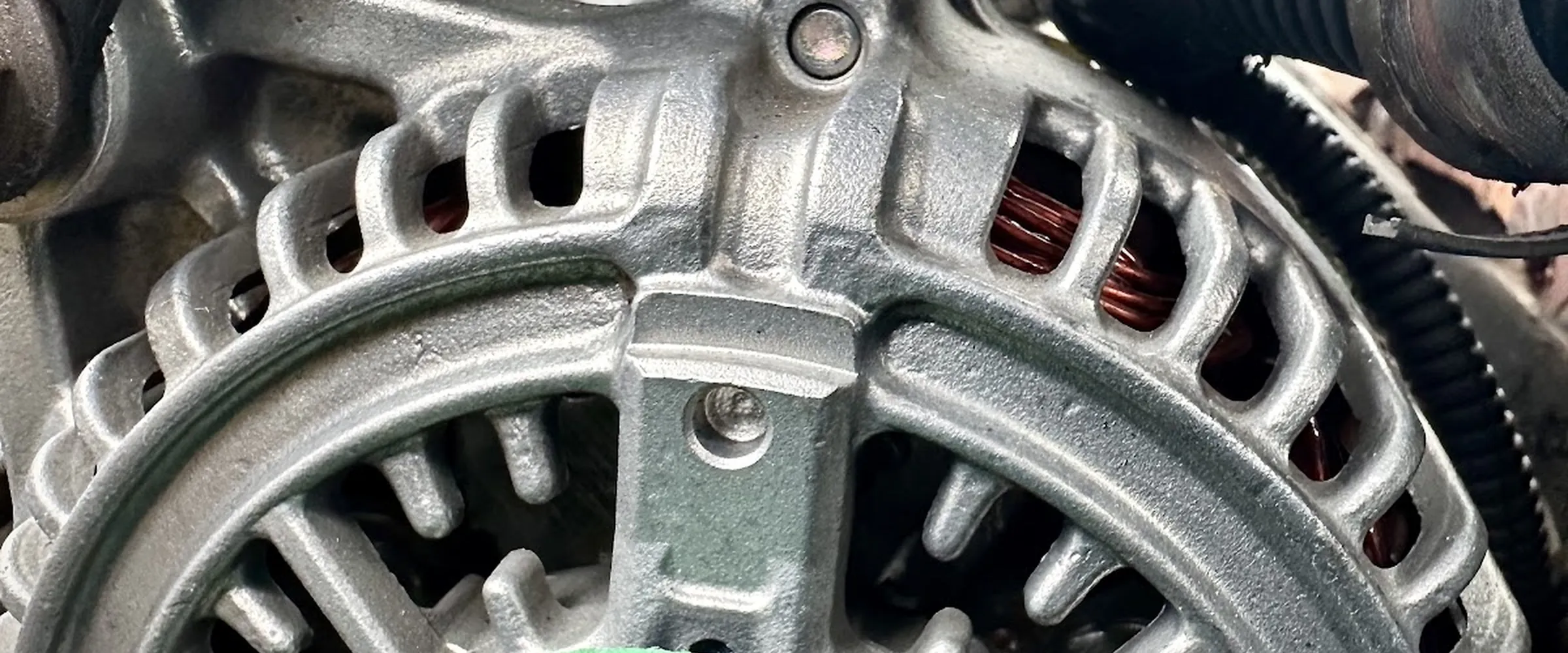 Engine work on a Ford Super Duty from a topside creeper