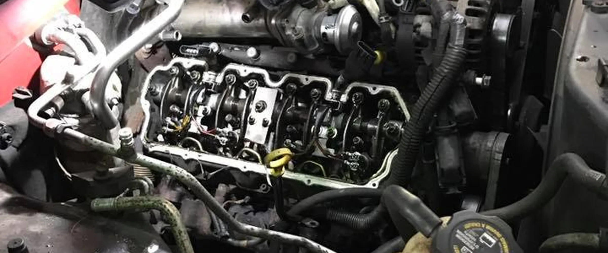 Timing chains and camshafts exposed for an engine repair